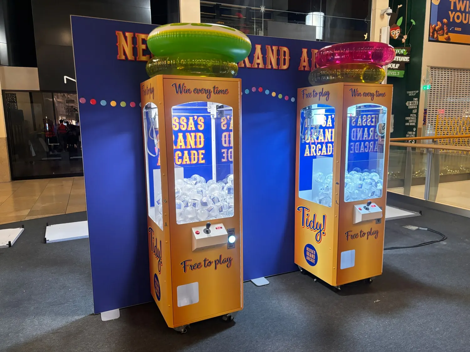 Two prize cranes in a shopping centre at Christmas