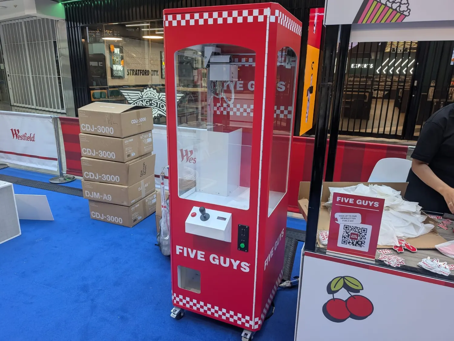 Branded claw machine hire for an event in Gloucester